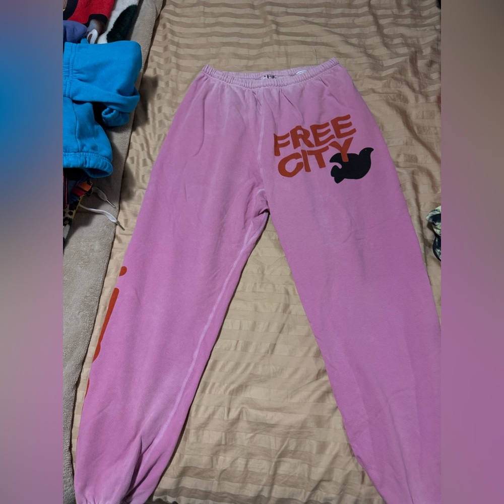 Let’s Go Free City pink sweatpants.